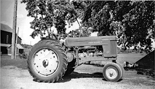 Jim Haldiman with John Deere tractor.